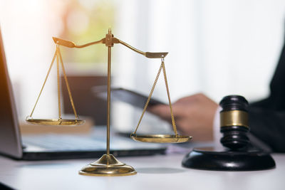 Close-up of electric lamp on table