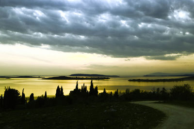 Scenic view of sea against cloudy sky