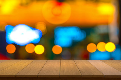 Close-up of illuminated lights on table