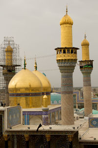 View of mosque in city