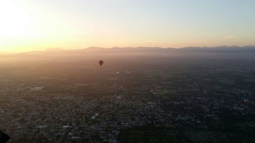 Aerial view of cityscape at sunset