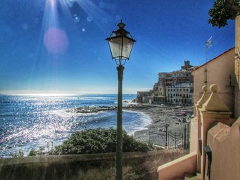 View of street light against blue sky