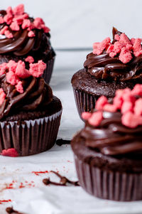 Close-up of cupcakes on table