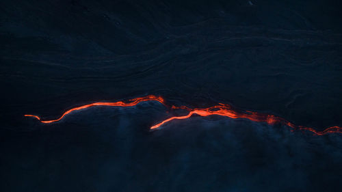 Lava flow from above on etna volcano in sicily - aerial panoramic view
