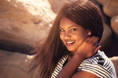 Portrait of smiling young woman