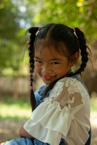 Portrait of cute girl smiling