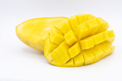 High angle view of yellow lemon against white background