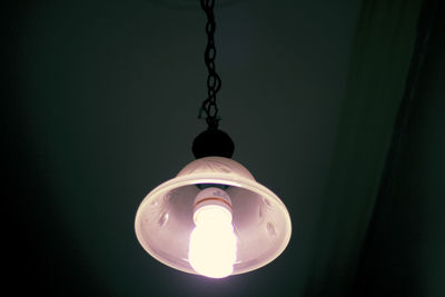 Close-up of illuminated light bulb