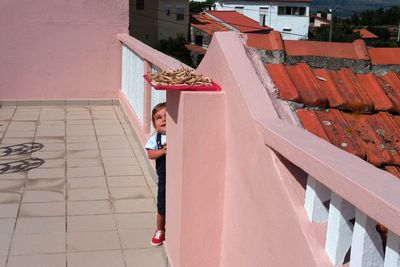 Curious child on terrace