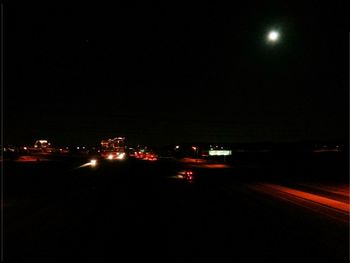 Light trails on road at night