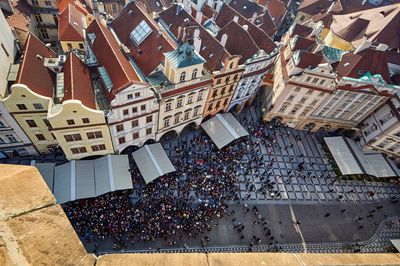 High angle view of people on road against buildings