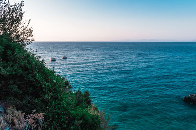 Scenic view of sea against clear sky