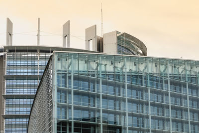 Low angle view of modern building against sky