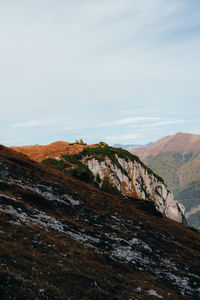 Scenic view of rocky mountains against sky