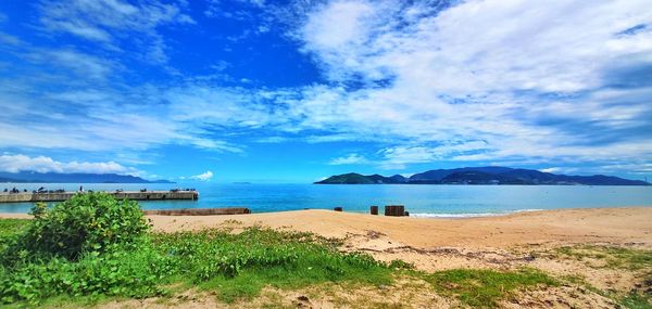 Scenic view of beach against sky