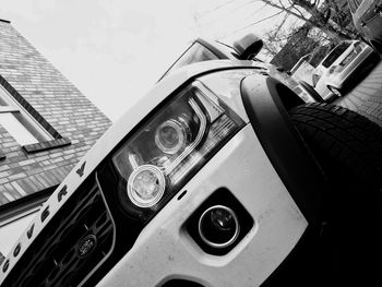 Low angle view of car against sky