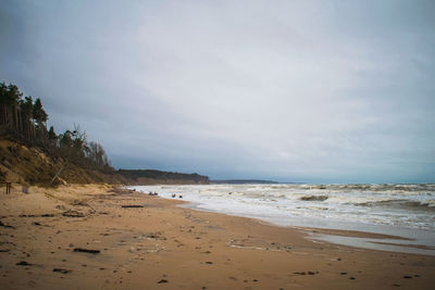 Scenic view of beach against sky