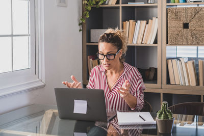 Man using laptop on table