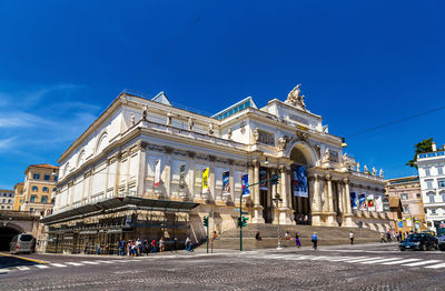 Low angle view of building against blue sky