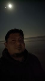 Portrait of man against sky