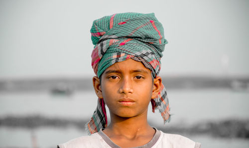 Portrait of boy in headwear outdoors