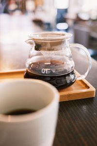 Coffee in pot on table