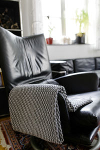 Close-up of sofa on table at home
