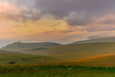 Scenic view of landscape against sky during sunset
