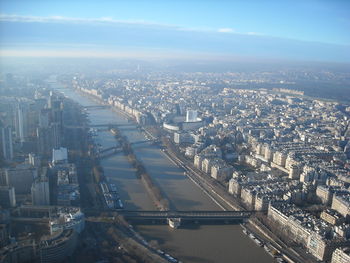 Aerial view of cityscape against sky