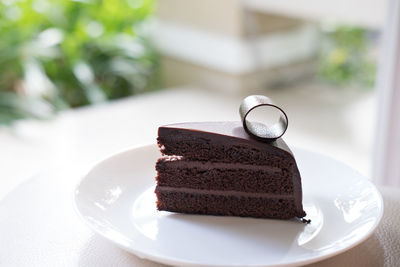 Close-up of cake served on table