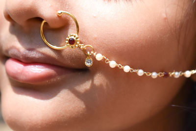 Close-up of girl with nose ring 