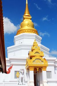 Low angle view of statue against sky