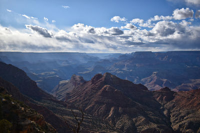 Scenic view of dramatic landscape against sky - at the grand canyon