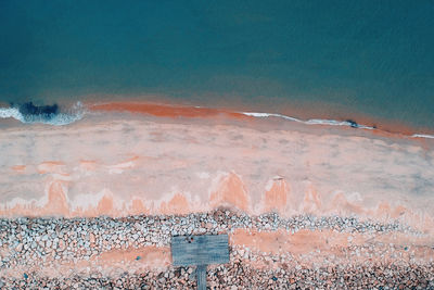 Scenic view of sea shore against clear sky