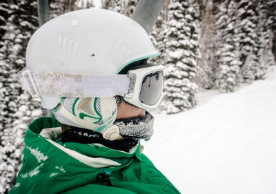 Close-up of woman ski helmet during winter