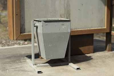 Garbage urn. a waste collection container. street wash for cigarette butts.