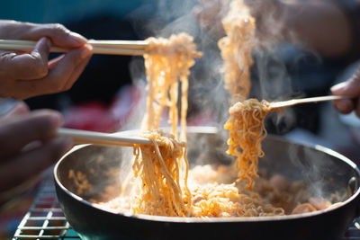 Close-up of person preparing food