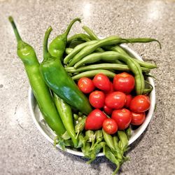 High angle view of fresh green chili peppers