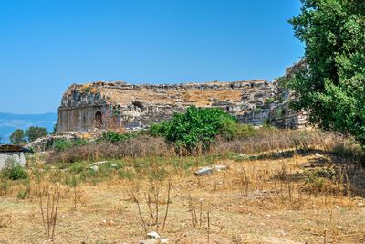 Old ruin building against blue sky