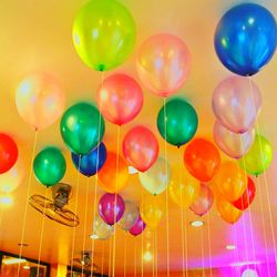 Low angle view of colorful balloons