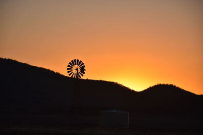 Scenic view of silhouette landscape against sky during sunset