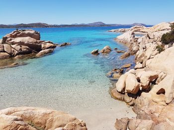 Panoramic view of sea against clear blue sky