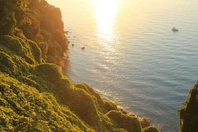 High angle view of sea at sunset