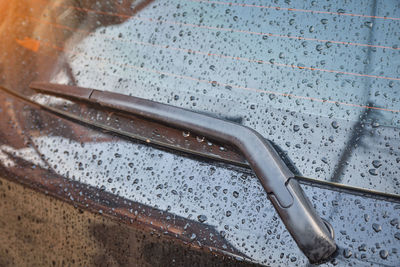 High angle view of wet metal table