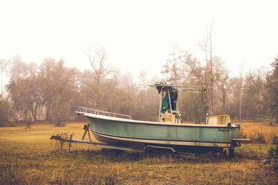 Boat on tree against sky