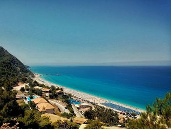 High angle view of sea against blue sky