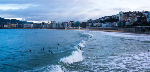 Scenic view of sea against cloudy sky