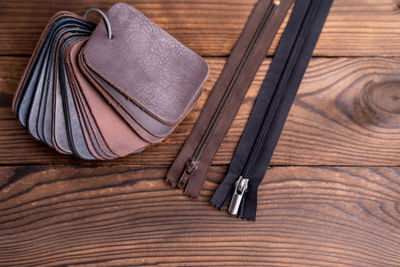 High angle view of leather on hardwood floor