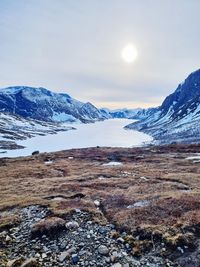 Scenic view of snowcapped mountains against sky