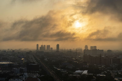 High angle view of buildings against sky during sunset